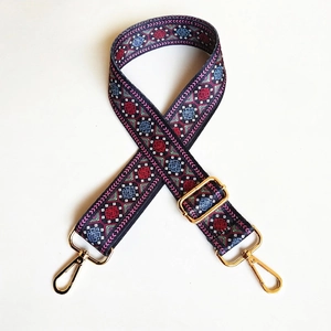 Adjustable wide shoulder strap with ethnic geometric pattern and gold metal lobster clasps