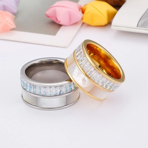 Chic shell-inlay wide band ring with sparkling crystal details in gold and silver finish