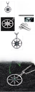 Detail of vintage stainless steel compass pendant with starburst cutout and dimensions
