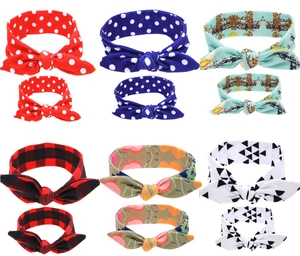 Matching mother and baby headband set with diverse patterns and rabbit ear bow details