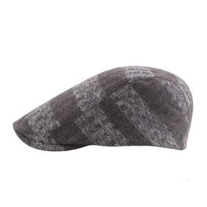Classic retro plaid flat cap for men and women made of textured grey-brown wool knit