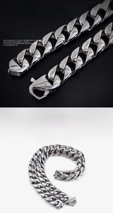 Detailed close-up of 15mm stainless steel Cuban link chain with secure lobster clasp