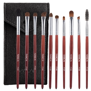 Detail of 10-piece natural hair eyeshadow brush set with red wooden handles and felt pouch