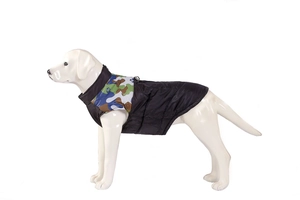 Close-up of winter pet vest showing quilted windproof nylon and camouflage stitching