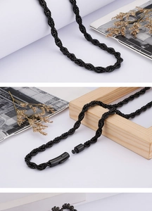 Detail view of a black twisted rope chain necklace featuring a secure lobster clasp closure