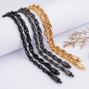 Mens stainless steel necklace set in gold and black with unique twisted link design