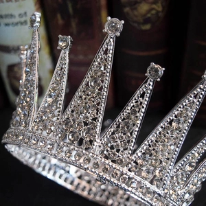 Macro shot of silver bridal crown featuring shimmering crystals and vintage European design