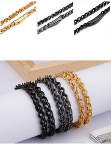 Detailed comparison of gold, grey, and black woven metal chains with secure cylindrical clasps