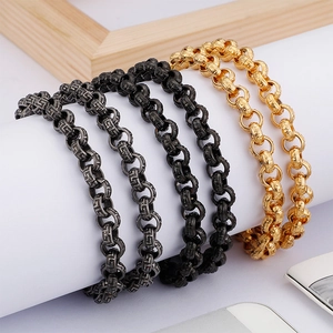 Classic stainless steel necklace set with Greek key patterns in gold and black finish