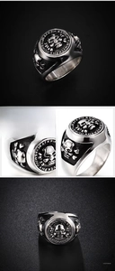 Detailed macro view of vintage stainless steel skull and crossbones punk ring for men