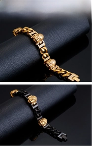Detailed close-up of Cuban link bracelets with Buddha heads and sparkling zircon stones