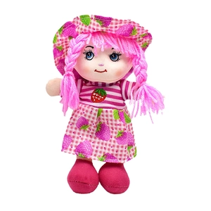Detail of cute strawberry plush doll featuring pink braided hair and checkered fruit dress