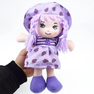Detailed view of a purple grape-themed plush doll featuring lavender braids and frilled hat