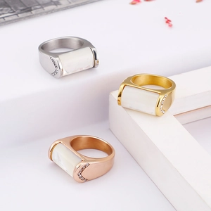 Minimalist titanium steel shell rings in silver, gold, and rose gold with rhinestones