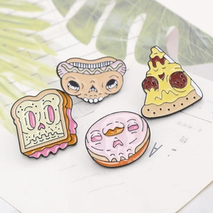 Set of 4 punk enamel pins featuring funny cartoon skeleton pizza and food designs