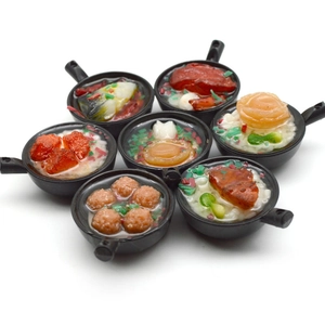 Miniature PVC Chinese food keychains featuring assorted stir-fry dishes in black pans