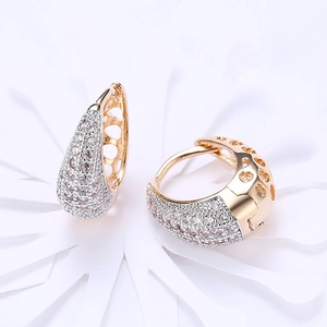 Elegant gold hollow heart earrings featuring micro-pave white cubic zirconia stones