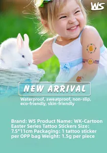 Easter cartoon waterproof tattoo stickers on child hand featuring bunnies and colorful eggs