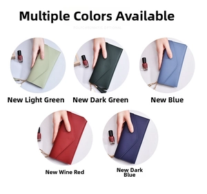 Detail showing envelope flap wallets with tassels and heart pendants in five colors