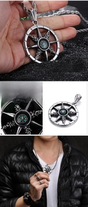Close-up of vintage punk compass pendant necklace with polished stainless steel chain
