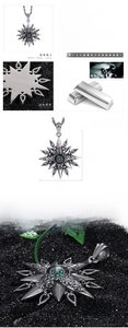 Macro detail of silver compass pendant back with 316L stainless steel engraving
