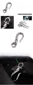 Detailed view of silver stainless steel keychain with dragon scale texture and dimensions