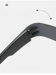 Detail of durable black punk sunglasses showing reinforced metal hinge and gray lenses
