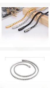 Detail of 5mm wide stainless steel mens chain necklace in multiple colors and wood setting