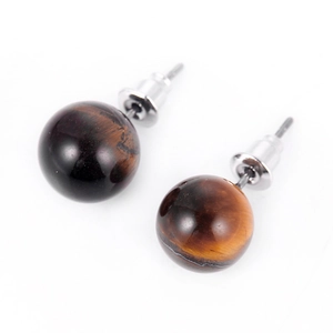 Macro shot of 10mm tiger eye stone stud earrings with silver-tone metal backing