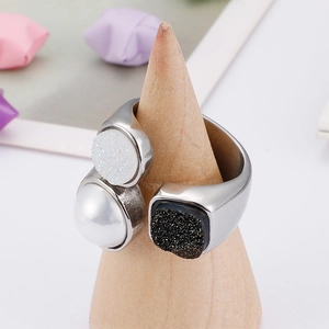 Chic silver titanium steel open ring with white pearl and crystals on wood stand