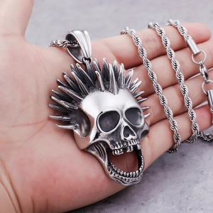 Vintage punk skull pendant necklace with spiked hair design on a stainless steel chain