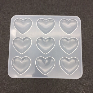 Top view of a 9-cavity heart silicone mold for resin casting and DIY soap making