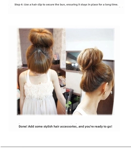 Detailed view of invisible U-shaped hairpins securing a bun hairstyle in brown hair
