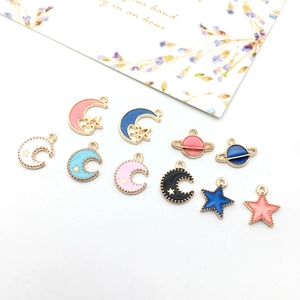 DIY gold alloy enamel charms set featuring colorful stars and moon pendant accessories