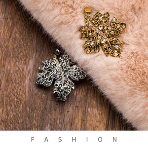 Vintage maple leaf brooches with sparkling rhinestones in antique gold and silver finishes