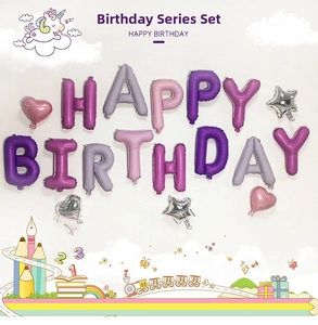 Detail of purple foil Happy Birthday balloons with hearts and stars in a party setup