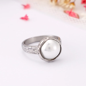Minimalist shell titanium steel ring with large white pearl and textured silver band