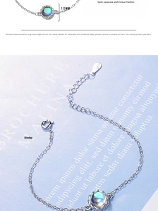 Detailed macro view showing the 10mm iridescent moonstone pendant and adjustable silver chain