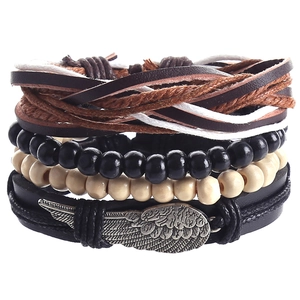 Multi-layer woven leather and wood bead bracelet set featuring metal angel wing charm