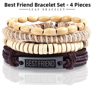 Detail of 4-piece woven bracelet set with wood beads and 'BEST FRIEND' metal charm