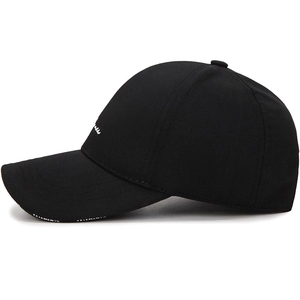 Classic black cotton baseball cap with white side embroidery and curved sun visor