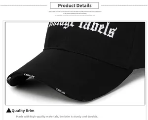 Detail of black baseball cap featuring Vintage Labels white embroidery and fashion brim