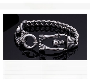 Macro shot of punk skull bracelet details with OT clasp and stainless steel bone links
