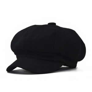 Classic solid black wool blend newsboy cap for men and women with a retro baker boy style