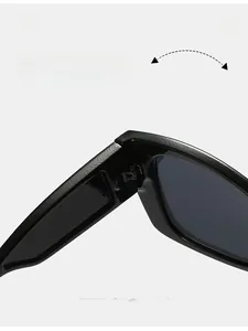 Close-up of durable textured hinges on cat eye sunglasses with black resin frame