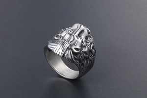 Detailed view of lion head steel ring featuring vintage textures and polished inner band