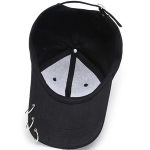 Streetwear black baseball cap with wool fabric and silver metal rings on the brim