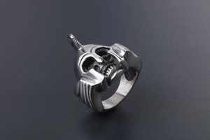 Detail of vintage silver titanium steel ring featuring a Spartan helmet skull design