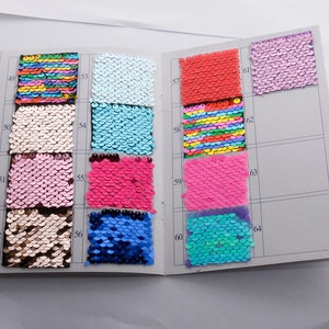 Detailed color chart showing various reflective sequin fabric samples in a grid layout