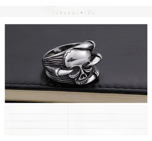 Detailed view of punk skeleton ring with eagle claw in vintage stainless steel